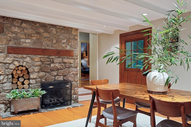 2320 Turk Rd, Doylestown, PA 18901 - dining space featuring hardwood / wood-style flooring, beam ceiling, and a fireplace