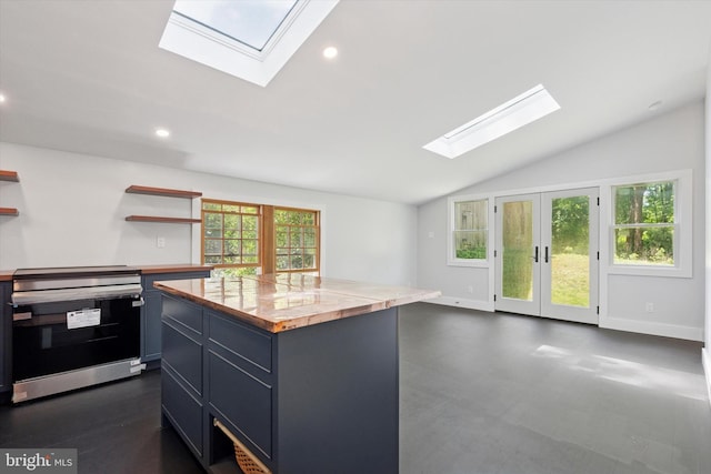 2320 Turk Rd, Doylestown, PA 18901 - kitchen with a skylight, stainless steel electric range oven, vaulted ceiling, open shelves, and a kitchen island