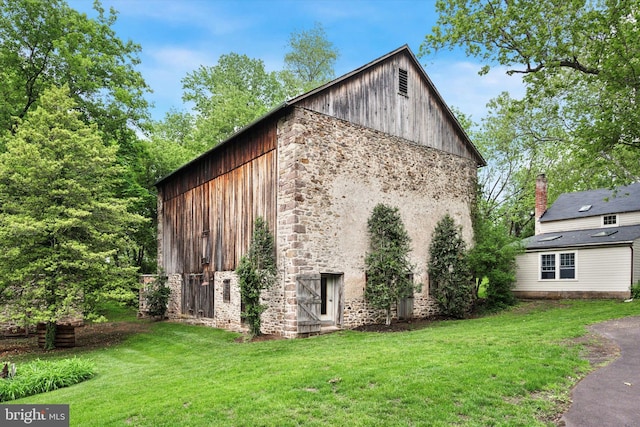 2320 Turk Rd, Doylestown, PA 18901 - view of property exterior featuring stone siding and a lawn