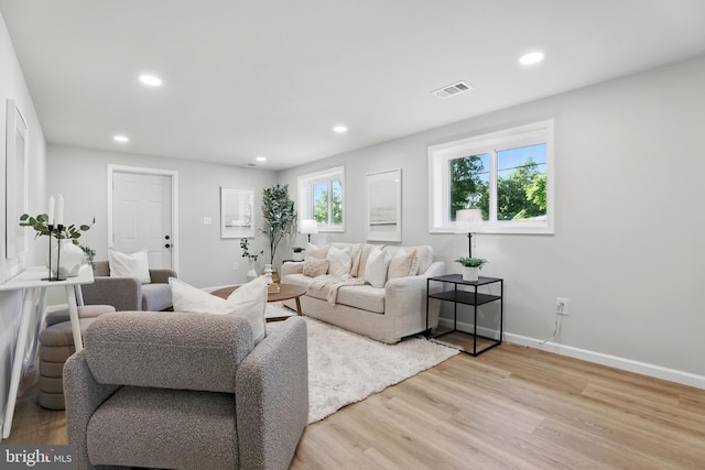 13803 Lionel Ln, Rockville, MD 20853 - living room with light wood finished floors, recessed lighting, and baseboards