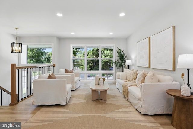 13803 Lionel Ln, Rockville, MD 20853 - living room featuring wood finished floors, recessed lighting, and a chandelier