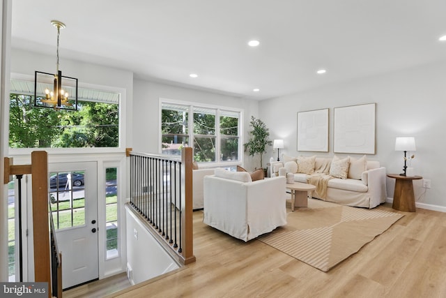 13803 Lionel Ln, Rockville, MD 20853 - living area with wood finished floors, recessed lighting, a chandelier, and baseboards