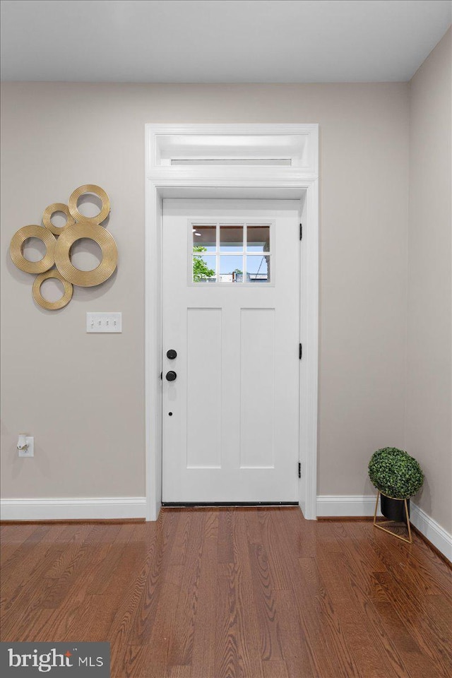 5521 4th St NW, Washington, DC 20011 - entryway featuring baseboards and wood finished floors