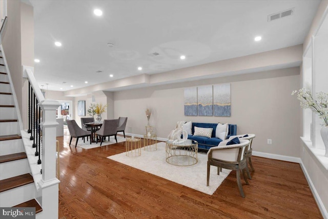 5521 4th St NW, Washington, DC 20011 - living room featuring stairway, wood finished floors, recessed lighting, and baseboards