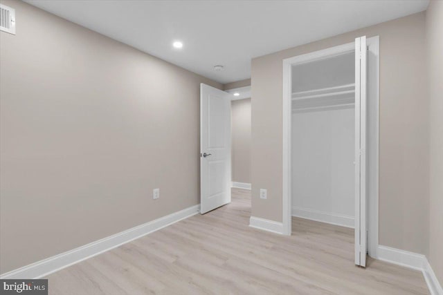 5521 4th St NW, Washington, DC 20011 - unfurnished bedroom with light wood finished floors, recessed lighting, baseboards, and a closet