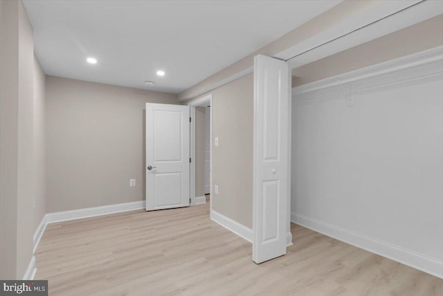 5521 4th St NW, Washington, DC 20011 - unfurnished bedroom with light wood finished floors, recessed lighting, baseboards, and a closet