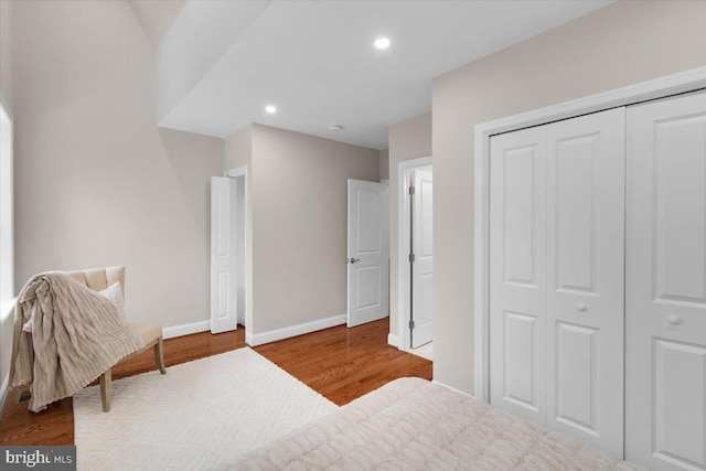 5521 4th St NW, Washington, DC 20011 - bedroom with wood finished floors, baseboards, a closet, and recessed lighting