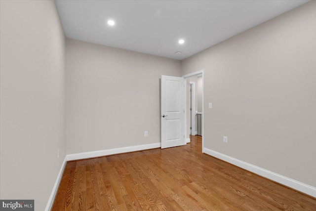 5521 4th St NW, Washington, DC 20011 - empty room featuring baseboards, wood finished floors, and recessed lighting
