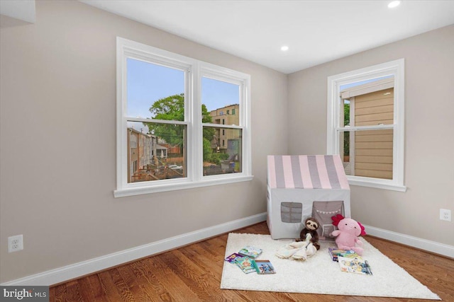 5521 4th St NW, Washington, DC 20011 - rec room with baseboards, wood finished floors, and recessed lighting