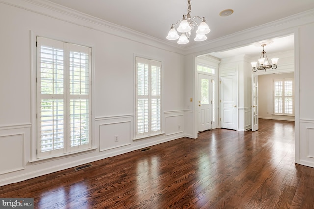 196 Pipers Inn Dr, Fountainville, PA 18923 - unfurnished room featuring a chandelier, a decorative wall, wood finished floors, ornamental molding, and wainscoting