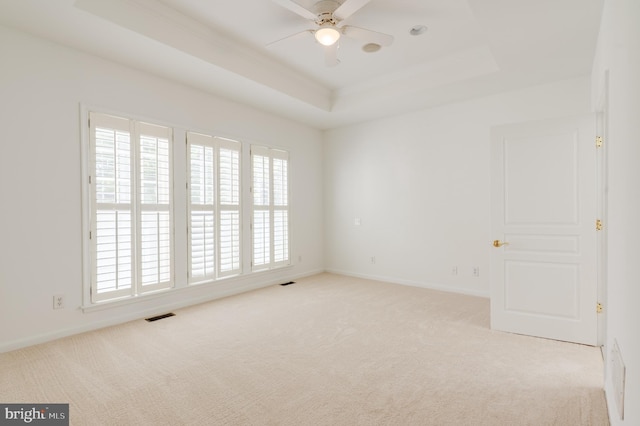 196 Pipers Inn Dr, Fountainville, PA 18923 - unfurnished room featuring light colored carpet, a tray ceiling, ceiling fan, baseboards, and crown molding