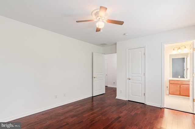 196 Pipers Inn Dr, Fountainville, PA 18923 - unfurnished bedroom with dark wood-type flooring, baseboards, ensuite bath, and a ceiling fan
