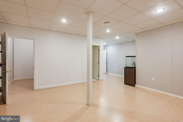 196 Pipers Inn Dr, Fountainville, PA 18923 - finished basement with wood finished floors, baseboards, and a paneled ceiling