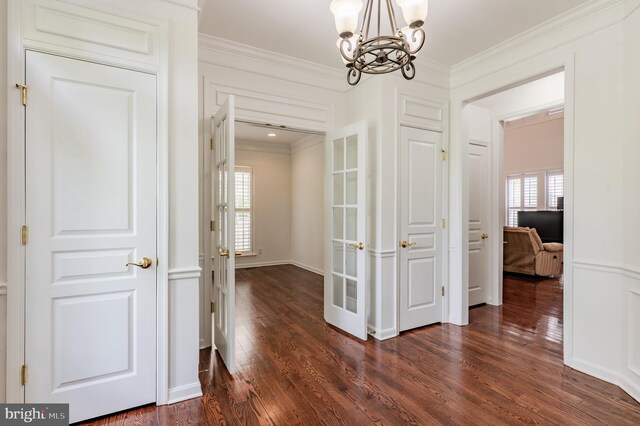 196 Pipers Inn Dr, Fountainville, PA 18923 - hall featuring a chandelier, plenty of natural light, dark wood-style flooring, and crown molding