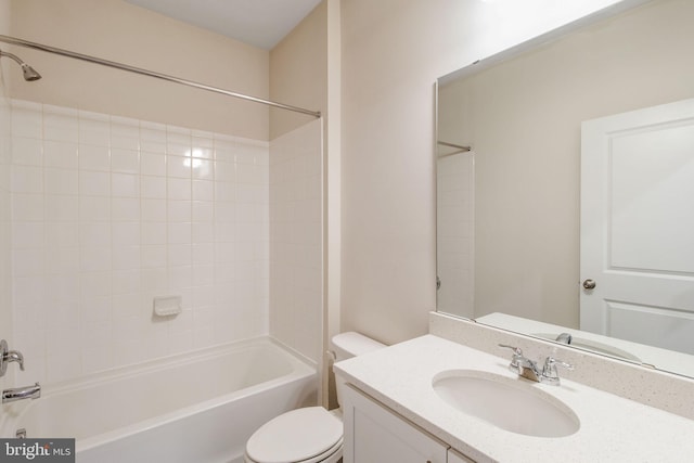 full bath featuring toilet, vanity, and bathtub / shower combination