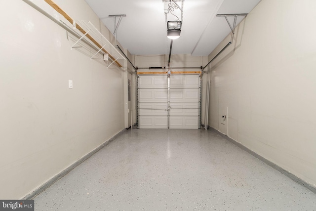 garage featuring baseboards