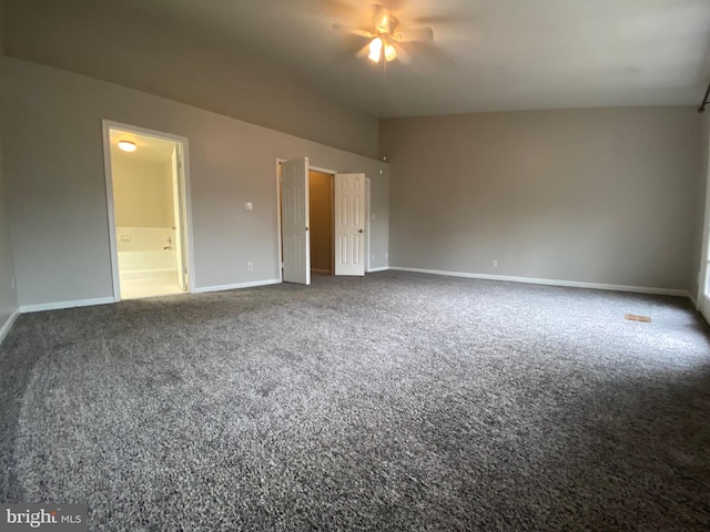12625 Kempston Ln, Woodbridge, VA 22192 - unfurnished bedroom featuring carpet, baseboards, ensuite bathroom, and lofted ceiling