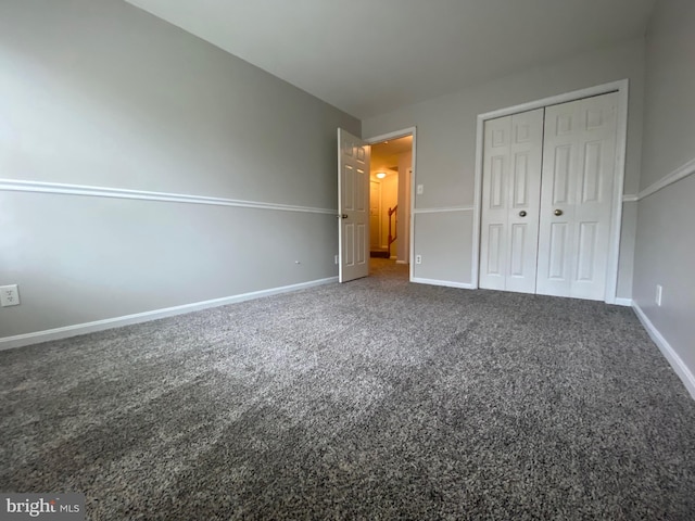 12625 Kempston Ln, Woodbridge, VA 22192 - unfurnished bedroom with carpet floors, baseboards, and a closet