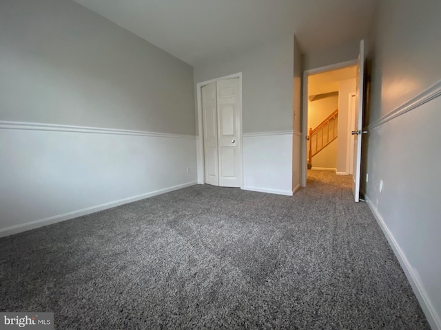 12625 Kempston Ln, Woodbridge, VA 22192 - unfurnished bedroom with carpet flooring and baseboards