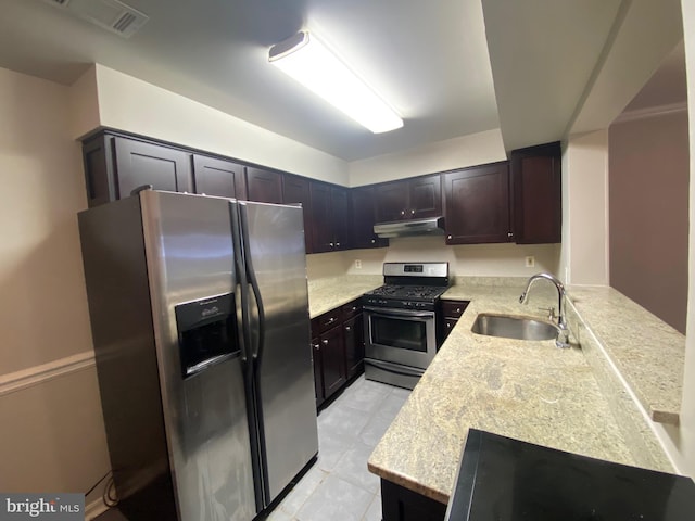 12625 Kempston Ln, Woodbridge, VA 22192 - kitchen featuring appliances with stainless steel finishes, a sink, under cabinet range hood, a peninsula, and light tile patterned flooring