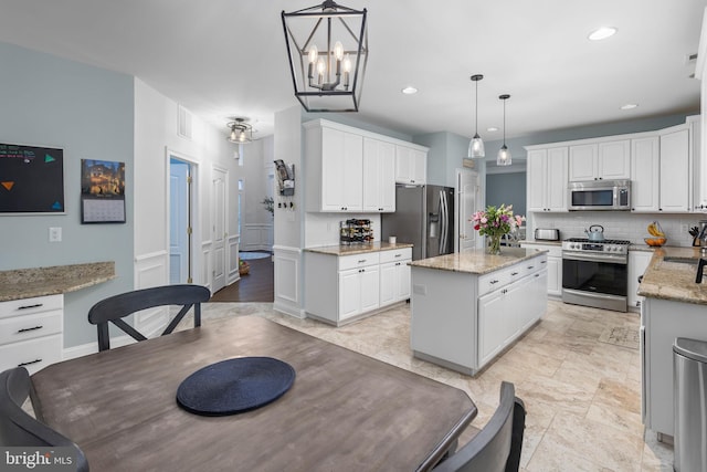 13 Richland Dr, Mount Laurel, NJ 08054 - kitchen with stainless steel appliances, tasteful backsplash, white cabinets, and recessed lighting