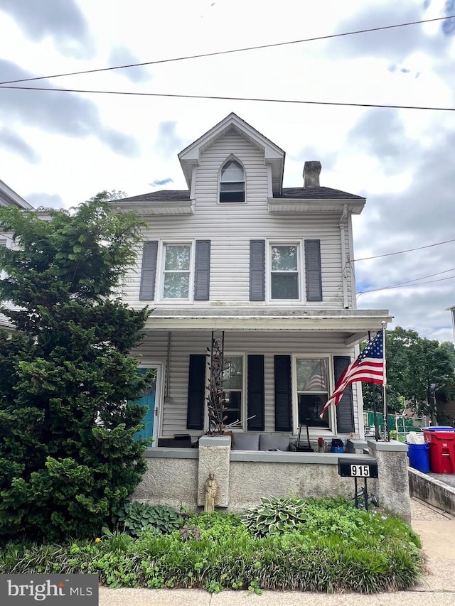 915 Spring Mill Ave, Conshohocken, PA 19428 - traditional style home featuring a porch and a chimney