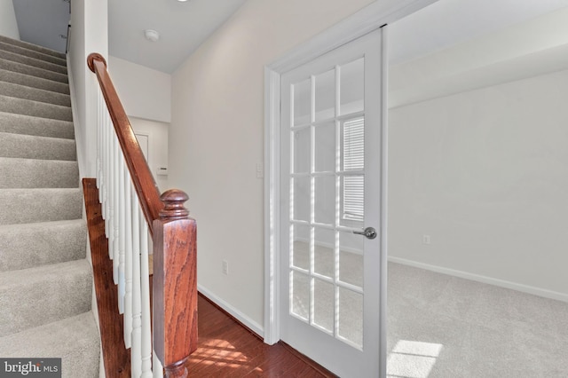 stairs featuring baseboards