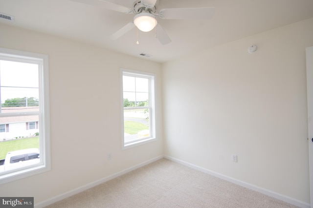 203 N First St, Greenwood, DE 19950 - unfurnished room featuring baseboards, light colored carpet, and a ceiling fan