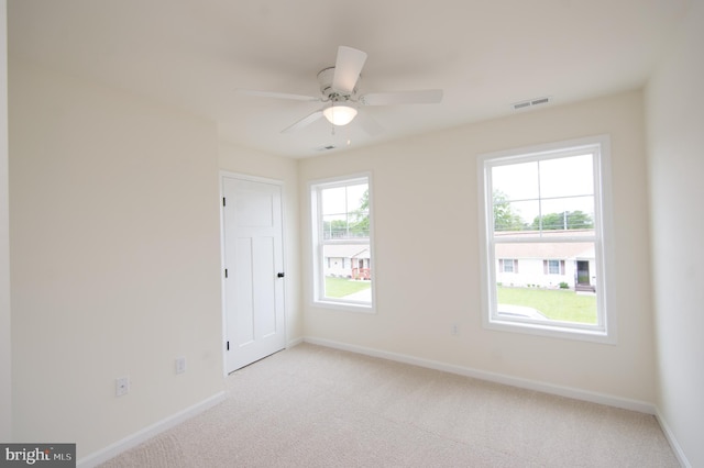 203 N First St, Greenwood, DE 19950 - unfurnished room with light carpet, baseboards, and ceiling fan