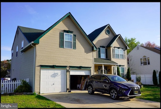 821 Streamview Ln, Vineland, NJ 08360 - view of front of home featuring driveway, fence, and a garage