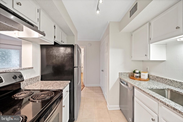 1525 Lincoln Way Unit 203, Mclean, VA 22102 - kitchen with appliances with stainless steel finishes, under cabinet range hood, white cabinetry, light tile patterned flooring, and light stone countertops