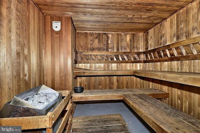 1525 Lincoln Way Unit 203, Mclean, VA 22102 - relaxing sauna / steam room featuring wood walls, concrete flooring, and wood ceiling