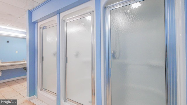 3101 Boardwalk Unit 1206-2, Atlantic City, NJ 08401 - full bath with a shower stall, tile patterned flooring, and baseboards