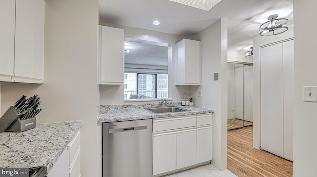 3101 Boardwalk Unit 1206-2, Atlantic City, NJ 08401 - kitchen featuring stainless steel appliances, a sink, white cabinets, light stone countertops, and recessed lighting