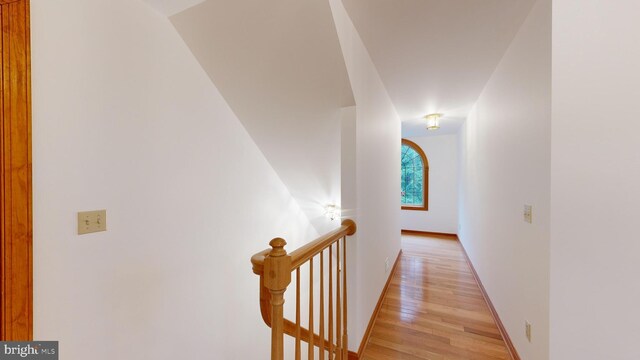 30751 Al Jan Dr, Laurel, DE 19956 - hallway featuring an upstairs landing and light wood-style flooring