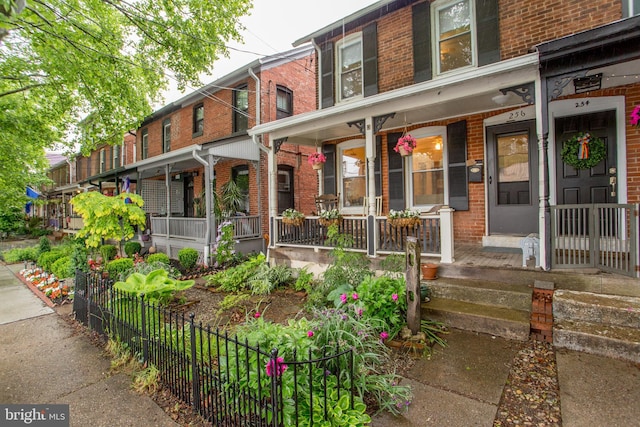 256 N Union St, Lambertville, NJ 08530 - entrance to property featuring brick siding and a porch