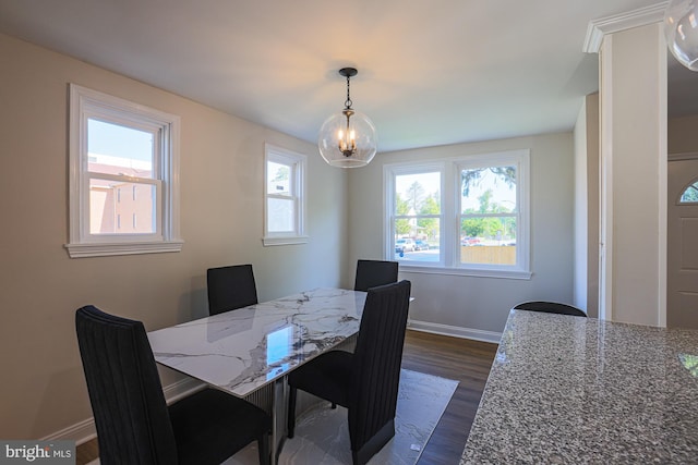 3958 Oakford Ave, Baltimore, MD 21215 - dining space featuring dark wood-type flooring and a chandelier