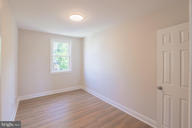 3958 Oakford Ave, Baltimore, MD 21215 - spare room with wood finished floors and baseboards