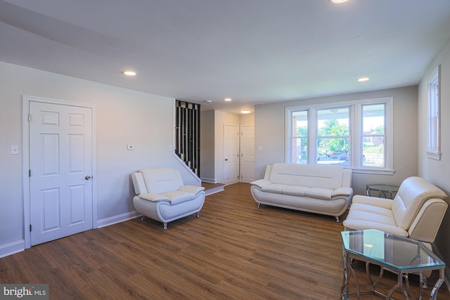3958 Oakford Ave, Baltimore, MD 21215 - living room featuring dark wood-style flooring, recessed lighting, and stairway