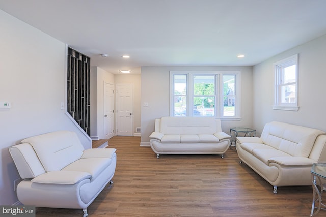 3958 Oakford Ave, Baltimore, MD 21215 - living room featuring wood finished floors, plenty of natural light, recessed lighting, and stairway