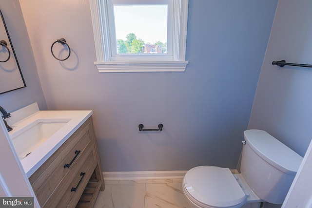 3958 Oakford Ave, Baltimore, MD 21215 - half bathroom featuring marble look tile flooring and vanity