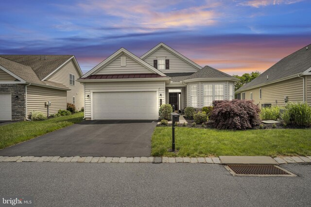 152 Independence Way, Mechanicsburg, PA 17050 - traditional home featuring asphalt driveway, a garage, a standing seam roof, a lawn, and metal roof