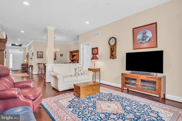 152 Independence Way, Mechanicsburg, PA 17050 - living room featuring wood finished floors, baseboards, recessed lighting, ornamental molding, and a chandelier