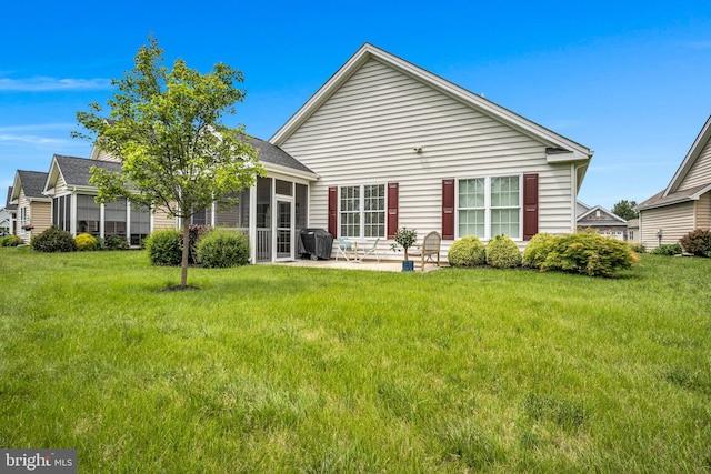 152 Independence Way, Mechanicsburg, PA 17050 - back of house with a patio area, a yard, and a sunroom