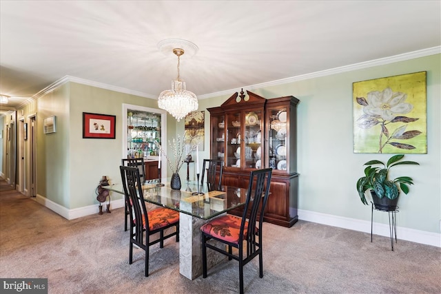 430 M St SW Unit N-609, Washington, DC 20024 - carpeted dining area featuring a chandelier, ornamental molding, and baseboards