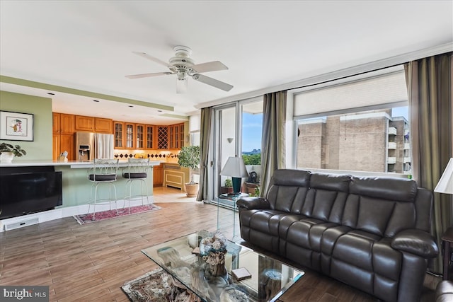 430 M St SW Unit N-609, Washington, DC 20024 - living room with ceiling fan and light wood-style floors