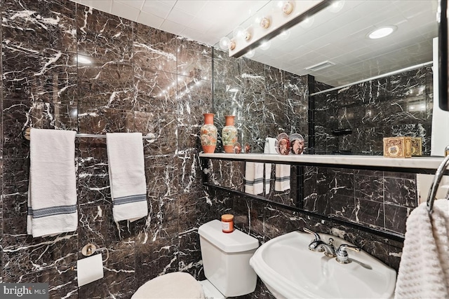 430 M St SW Unit N-609, Washington, DC 20024 - full bath with a sink, tile walls, toilet, and a shower