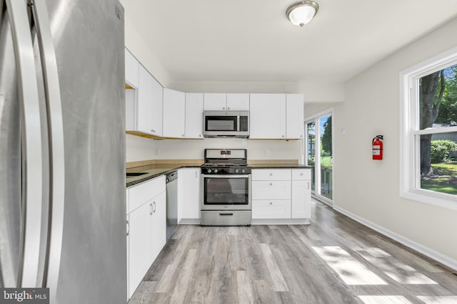 414 Lavender Hill Dr, Cherry Hill, NJ 08003 - kitchen featuring appliances with stainless steel finishes, plenty of natural light, and dark countertops