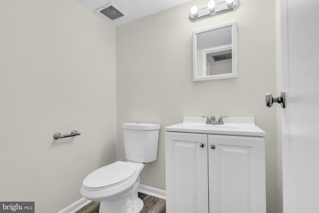 414 Lavender Hill Dr, Cherry Hill, NJ 08003 - bathroom with wood finished floors, baseboards, vanity, and toilet