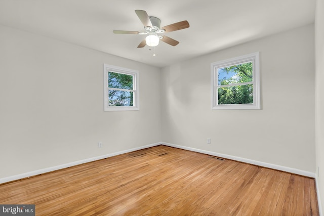 414 Lavender Hill Dr, Cherry Hill, NJ 08003 - empty room with baseboards, healthy amount of natural light, and wood finished floors